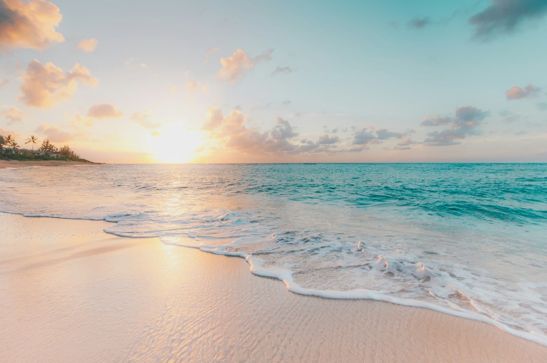 Tropical beach resort at sunset